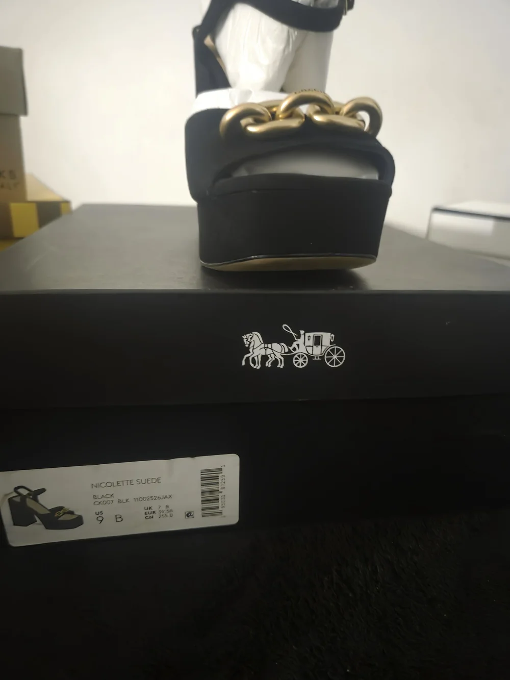Coach black suede